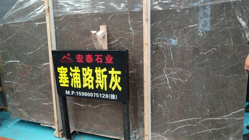 玻璃石材混合幕墙与纯玻璃幕墙的区别